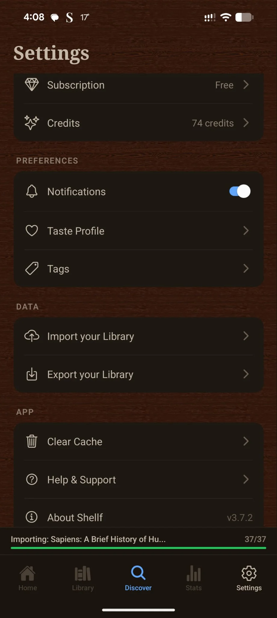 Shellf Settings screen with a progress bar at the bottom reading 'Importing: Sapiens: A Brief History of Hu... 37/37' while the user browses the app